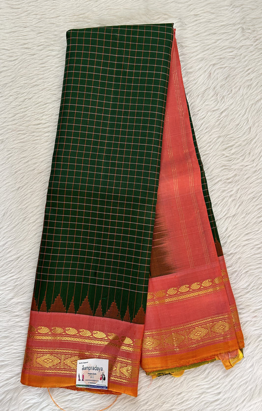 Gadwal Pattu Green Colored Saree Complemented With a Pattu Peach Color Kanchi Gap Border - Sampradaya Designer Studio