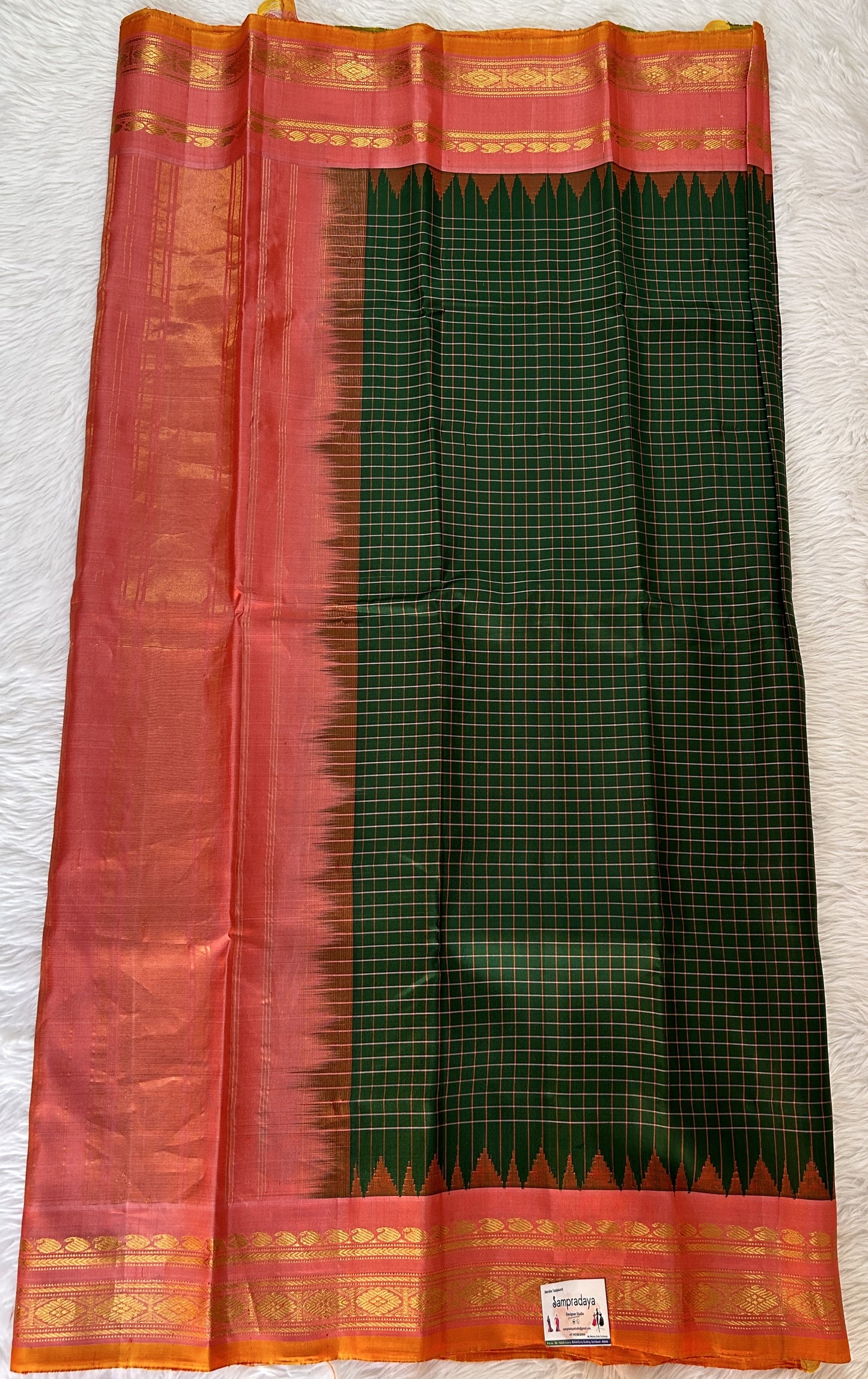 Gadwal Pattu Saree Dark Green Colored Saree Complemented With a Pattu Dark Orange Color Kanchi Border - Sampradaya Designer Studio