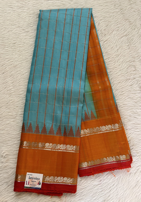 Gadwal Pattu Saree Sky Blue Colored Saree Complemented With a Pattu Orange Color Gap Border - Sampradaya Designer Studio