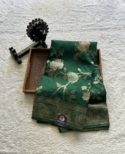Semi Georgette Allover Saree Pine Green Colored Elegantly Paired with a Zari Border. - Sampradaya Designer Studio