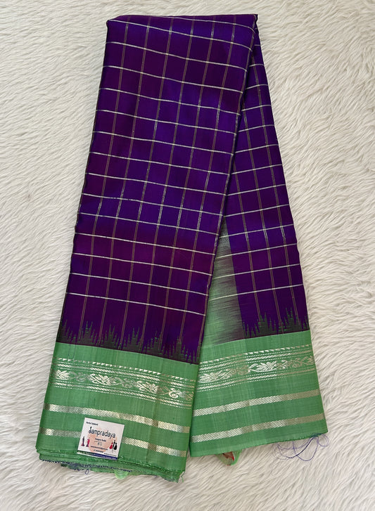 Gadwal Pattu Saree Dark Violet Colored Checks Saree Complemented With a Pattu Green Color Kanchi Gap Border - Sampradaya Designer Studio