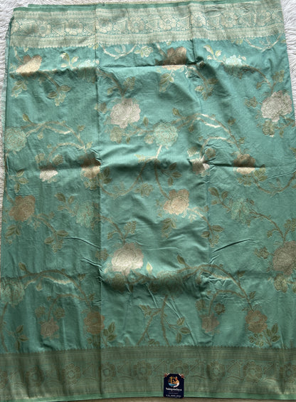 Semi Georgette Saree Light Sea Green Colored Elegantly Paired with a Zari Border. - Sampradaya Designer Studio