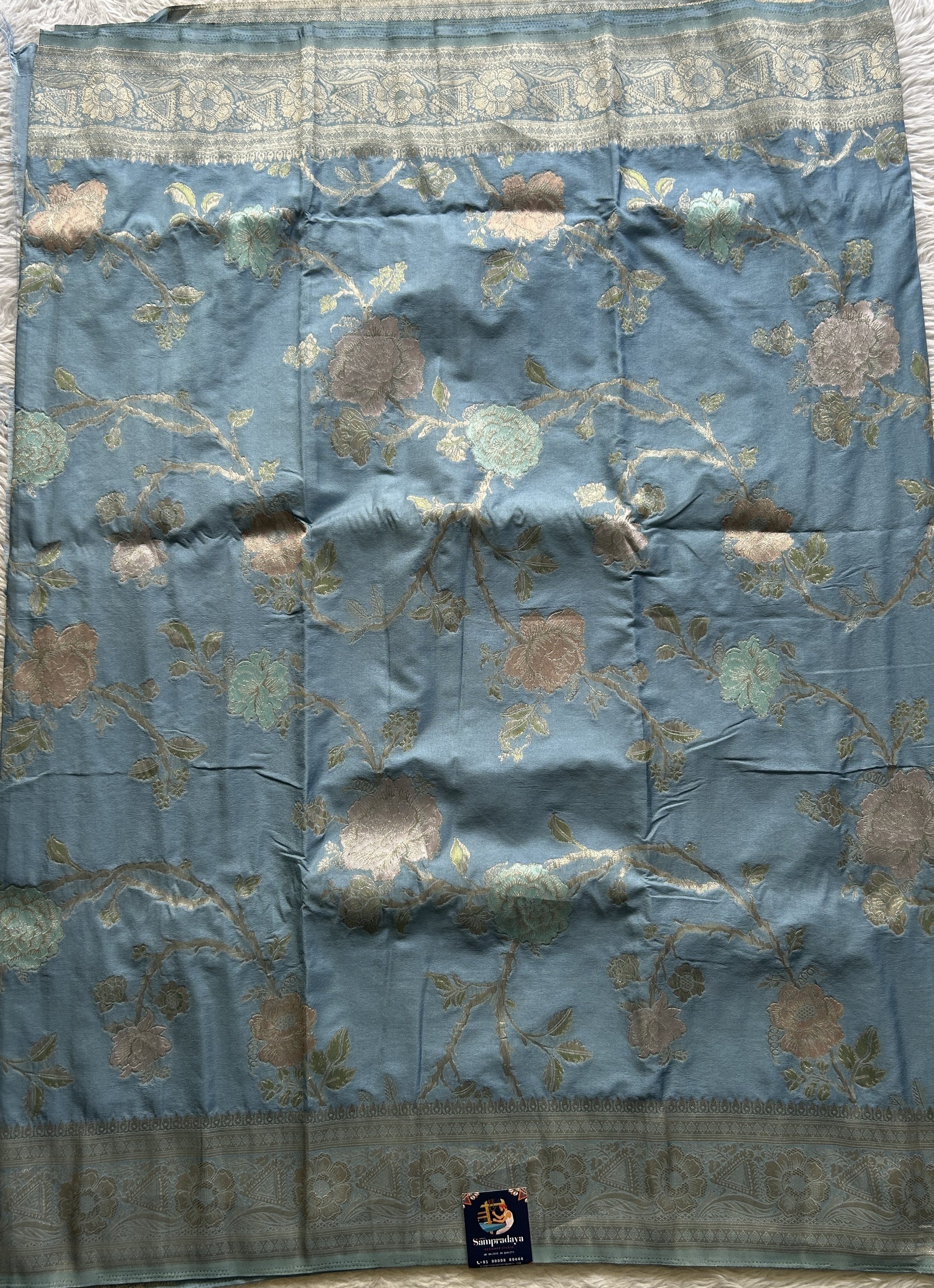 Semi Georgette Saree Light Aqua Blue Colored Elegantly Paired with a Zari Border. - Sampradaya Designer Studio