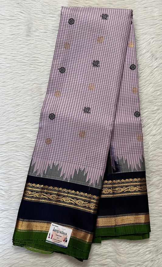 Gadwal Pattu Saree Pastel Lavender Colored Checks Saree Complemented With a Pattu Dark Carbon Blue Color Kanchi Gap Border - Sampradaya Designer Studio