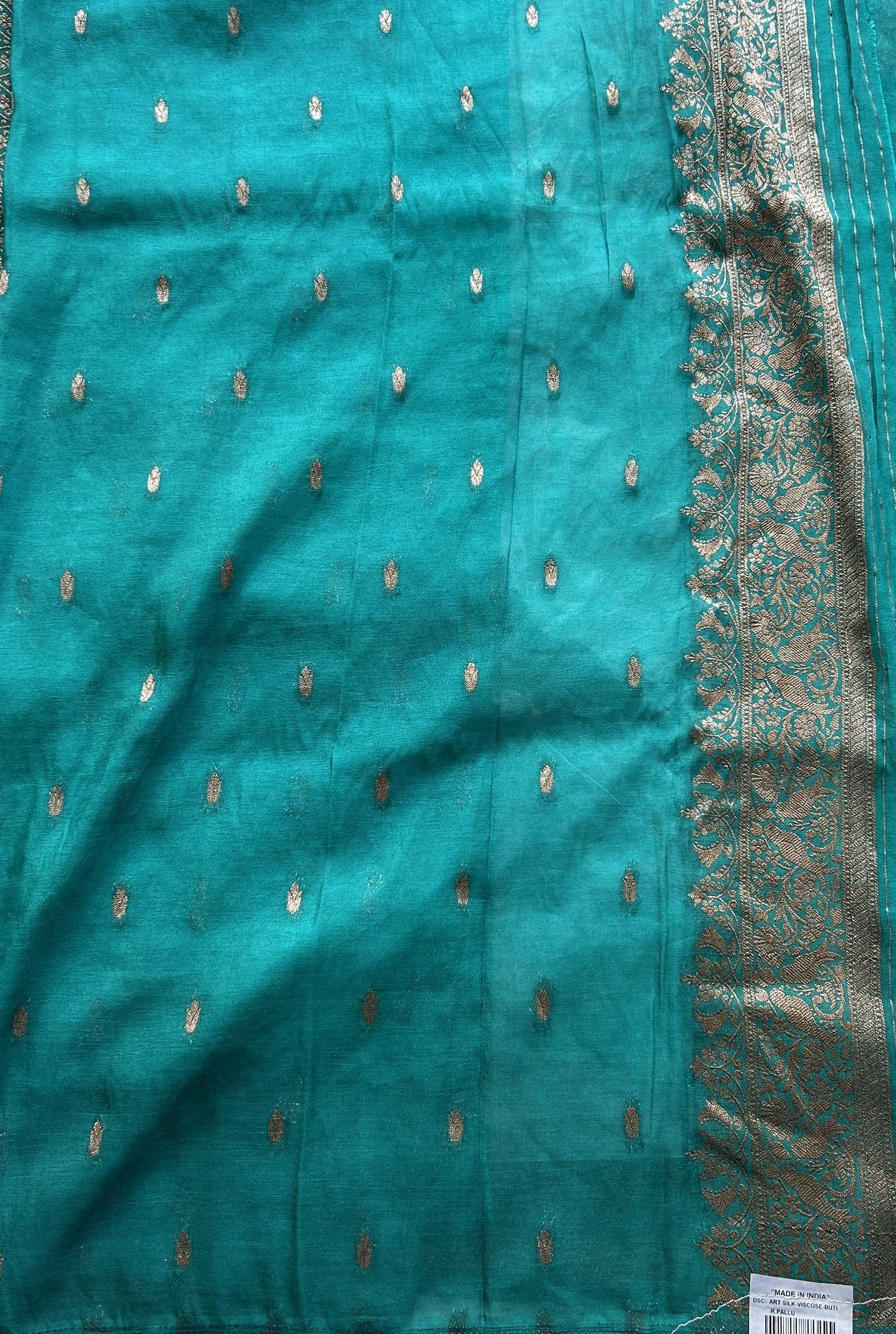 Semi Georgette Saree Turquoise Blue Colored Elegantly Paired with a Zari Border. - Sampradaya Designer Studio