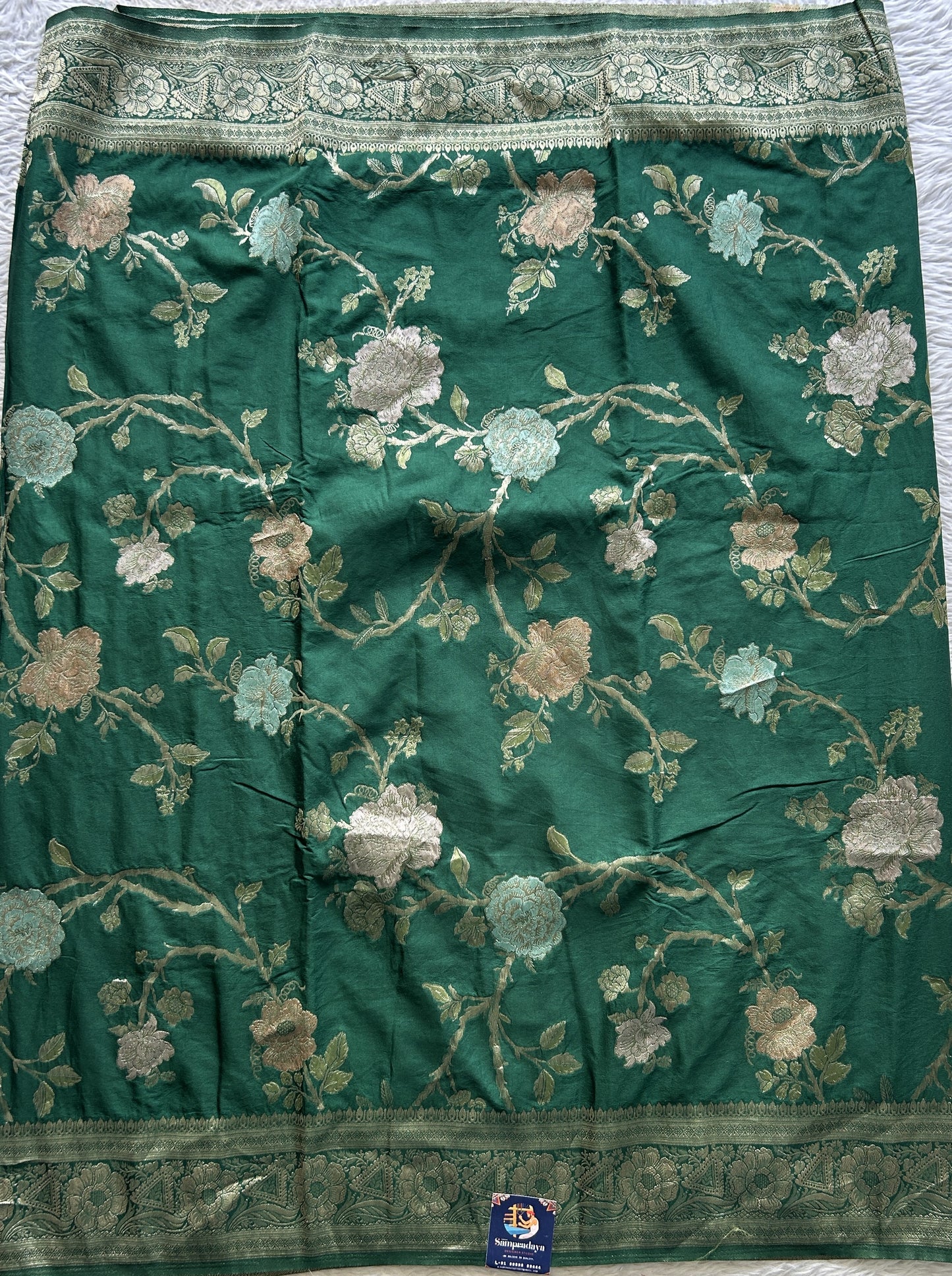 Semi Georgette Allover Saree Pine Green Colored Elegantly Paired with a Zari Border. - Sampradaya Designer Studio