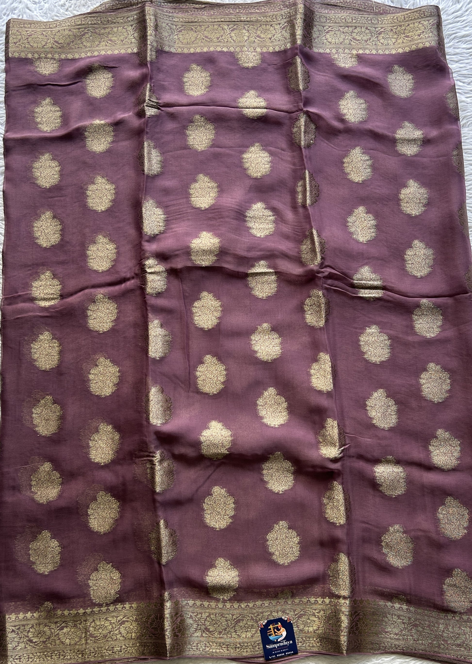 Semi Georgette Saree Raspberry Colored Elegantly Paired with a Zari Border. - Sampradaya Designer Studio