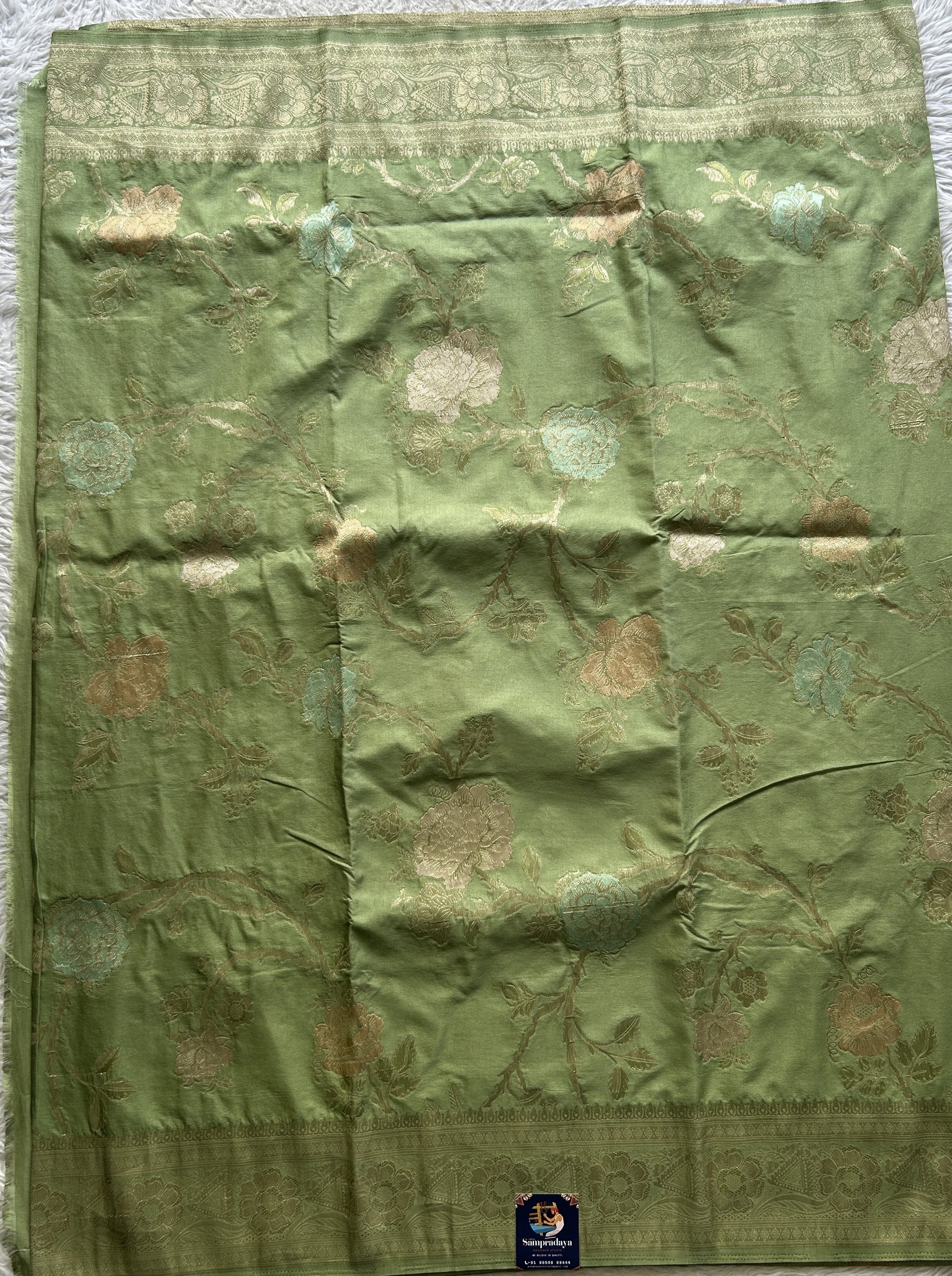 Semi Georgette Allover Saree Pista Green Colored Elegantly Paired with a Zari Border. - Sampradaya Designer Studio