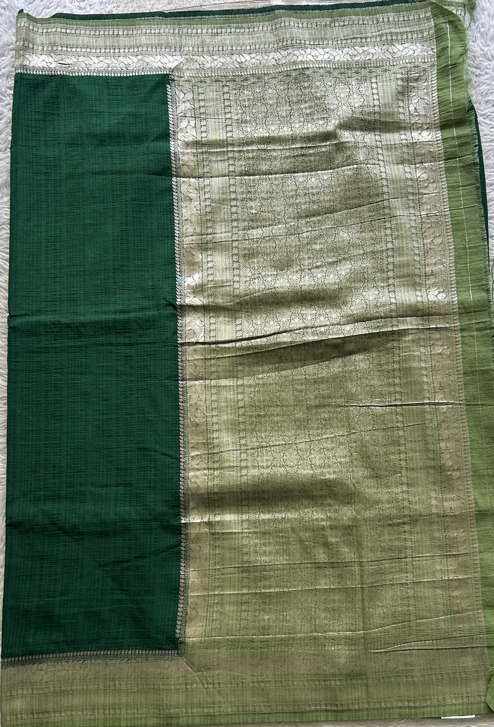 Semi Georgette Plain Saree Dark Green Colored Elegantly Paired with a Zari Border. - Sampradaya Designer Studio