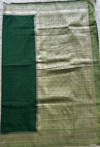 Semi Georgette Plain Saree Dark Green Colored Elegantly Paired with a Zari Border. - Sampradaya Designer Studio