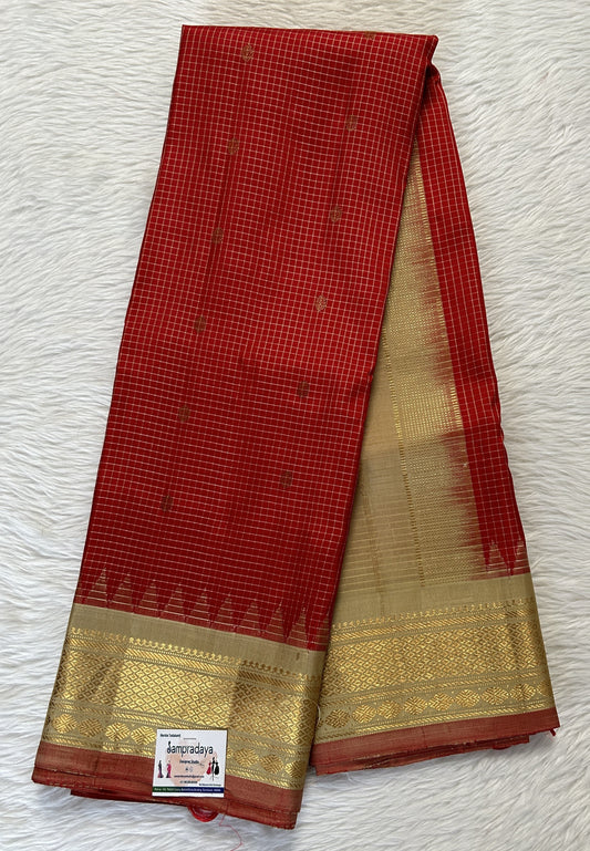 Gadwal Pattu Red Colored Saree Complemented With a Pattu Cream Color Kanchi Border - Sampradaya Designer Studio