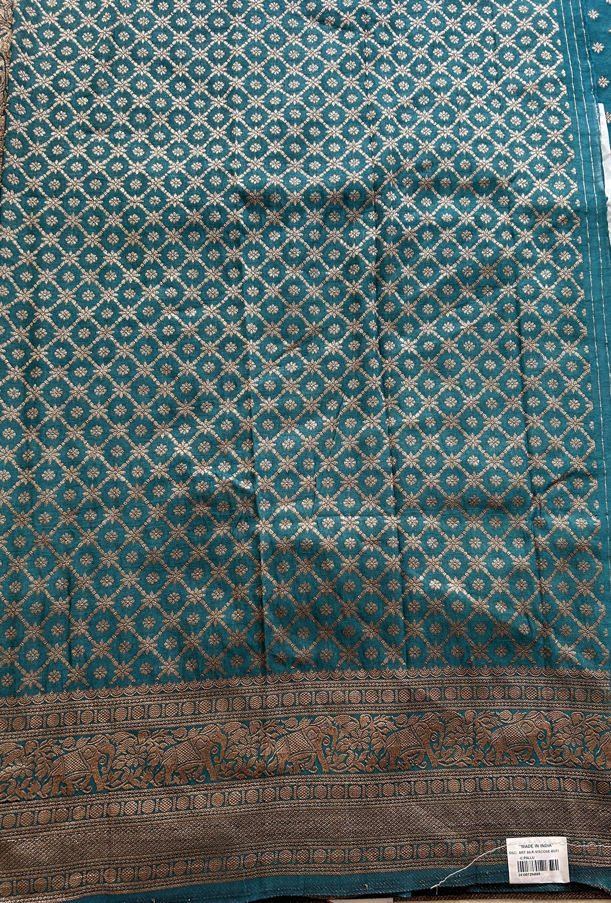 Semi Georgette Saree Teal Blue Colored Elegantly Paired with a Zari Border. - Sampradaya Designer Studio