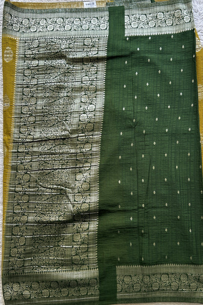 Semi Georgette Saree Mustard Colored Complemented with a Green Zari Border. - Sampradaya Designer Studio