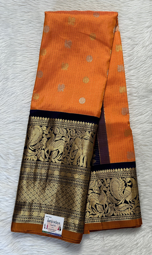 Gadwal Pattu Orange Colored Checks Saree Complemented With a Pattu Ink Blue Color Kanchi Border - Sampradaya Designer Studio