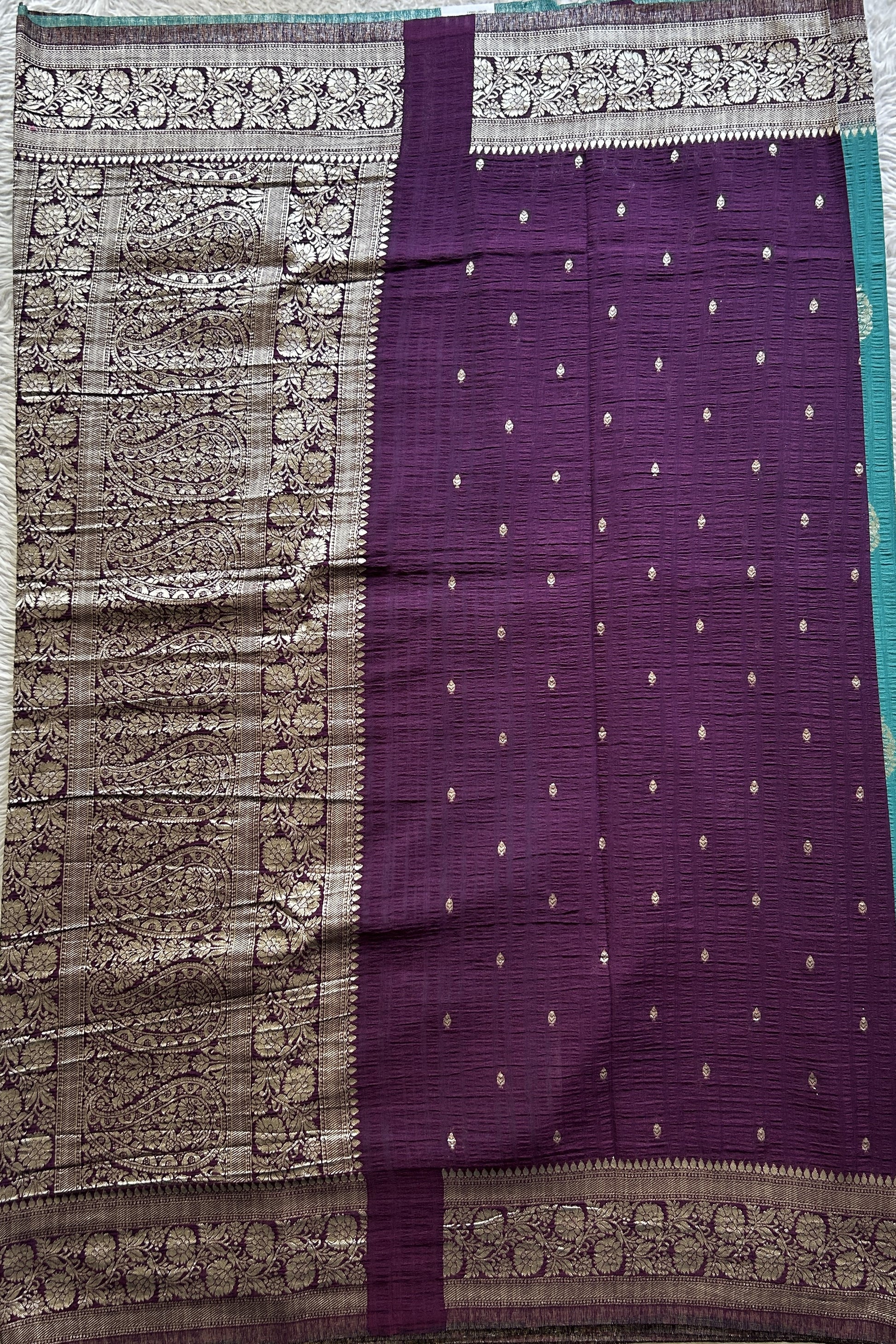 Semi Georgette Saree Aqua Blue Colored Complemented with a Purple Zari Border. - Sampradaya Designer Studio