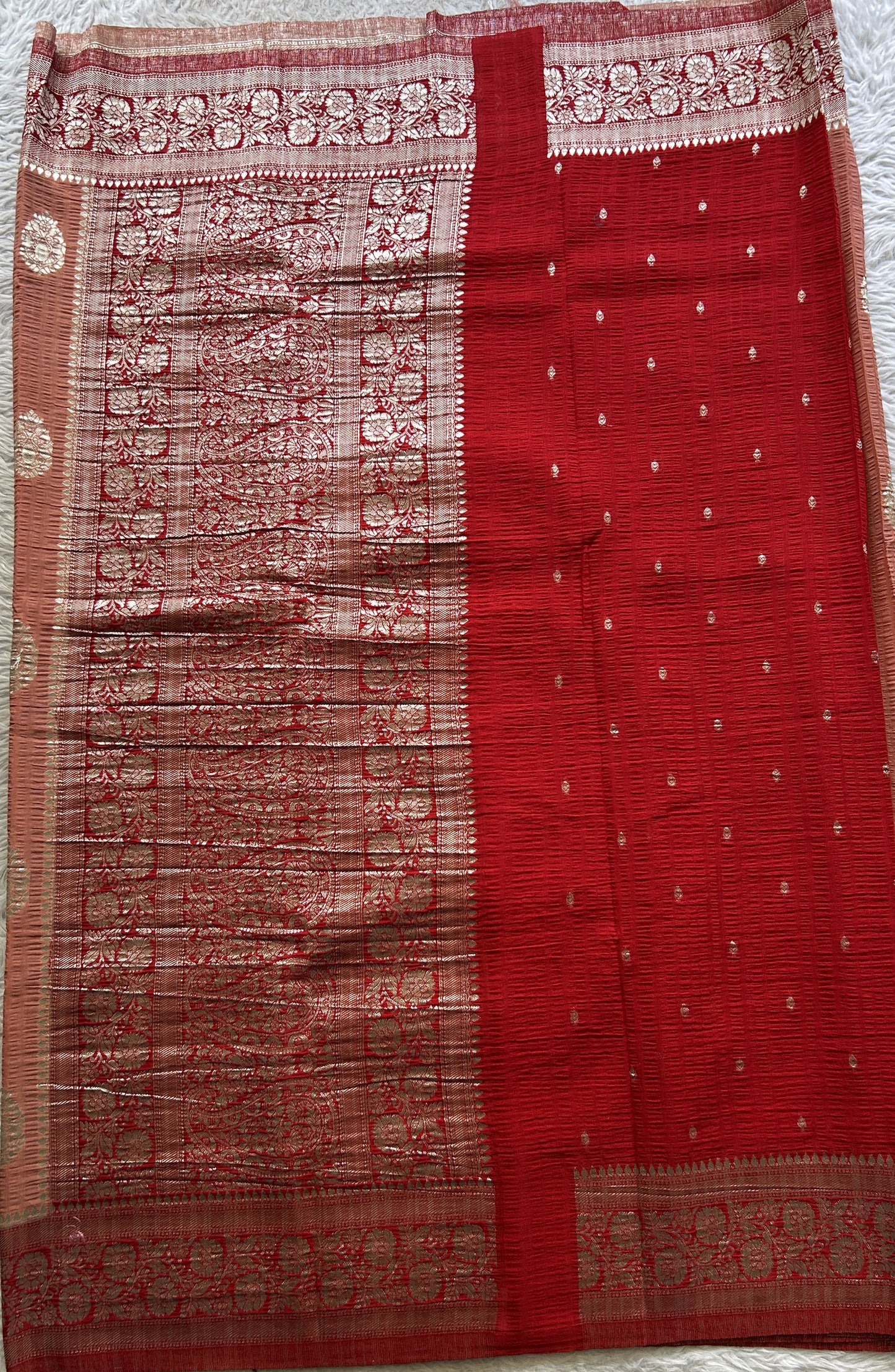 Semi Georgette Saree Pale Orange Colored Complemented with a Zari Border. - Sampradaya Designer Studio