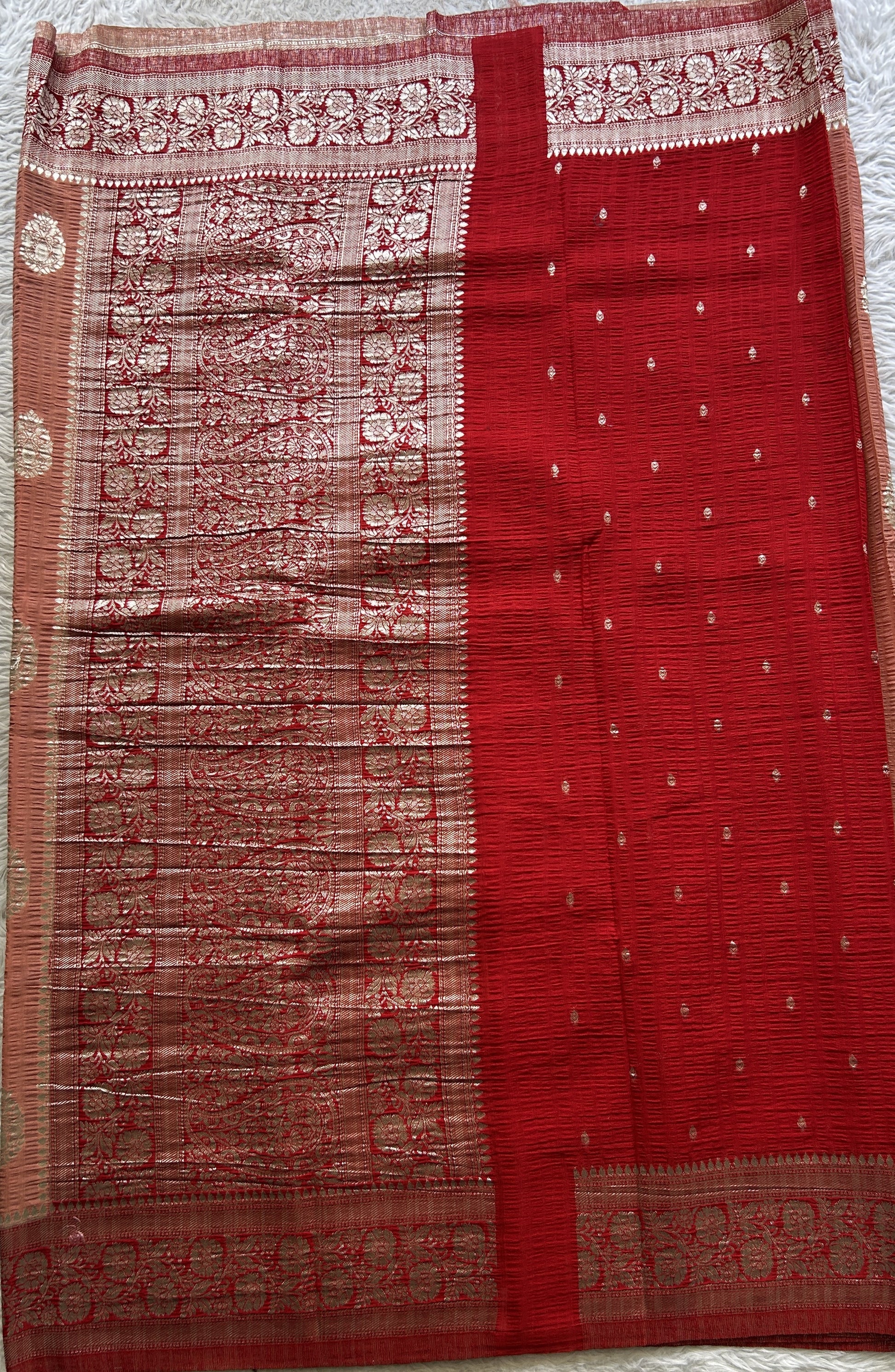 Semi Georgette Saree Pale Orange Colored Complemented with a Zari Border. - Sampradaya Designer Studio