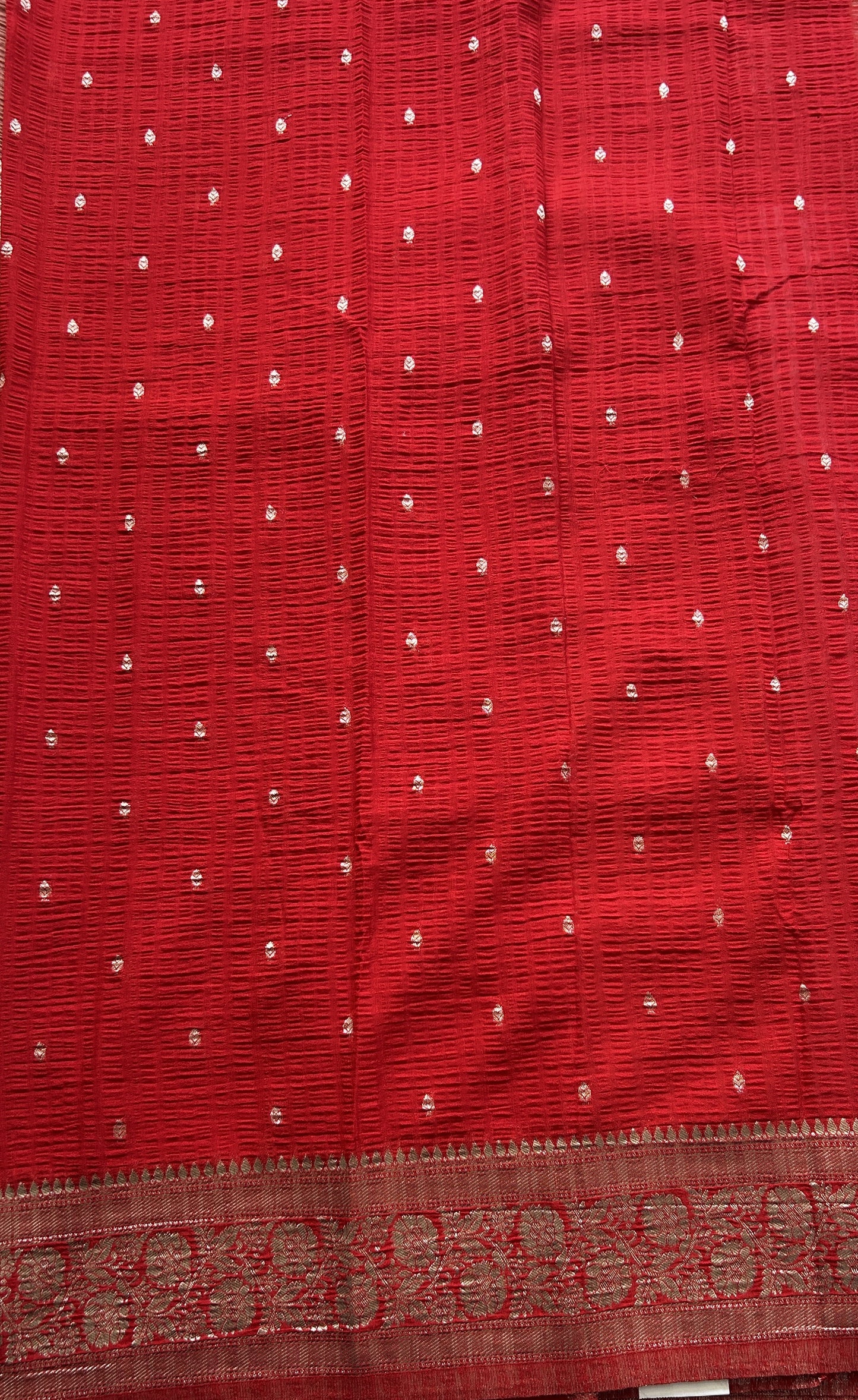 Semi Georgette Saree Pale Orange Colored Complemented with a Zari Border. - Sampradaya Designer Studio