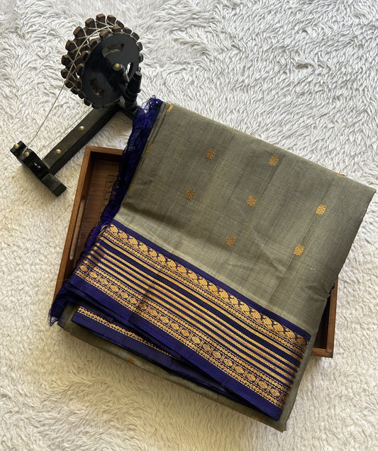 Gadwal Sico Saree Steel Gray colored complemented with a Gold Zari Border