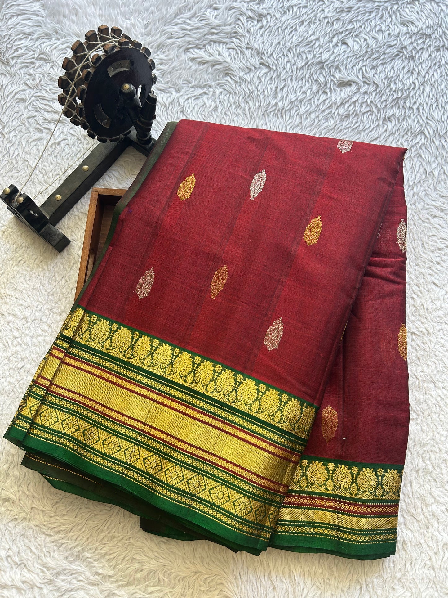 Gadwal Sico Saree  Maroon colored complemented with a Gold Zari Border - Sampradaya Designer Studio