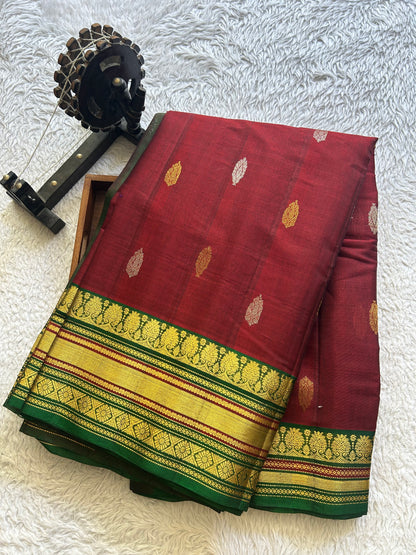 Gadwal Sico Saree  Maroon colored complemented with a Gold Zari Border - Sampradaya Designer Studio