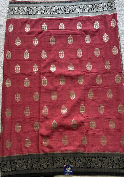 Semi Georgette Saree Punch Colored Complemented with a Zari Border. - Sampradaya Designer Studio