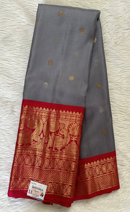 Gadwal Pattu Gray Colored Saree Complemented With a Pattu Pink Color Kanchi Border - Sampradaya Designer Studio