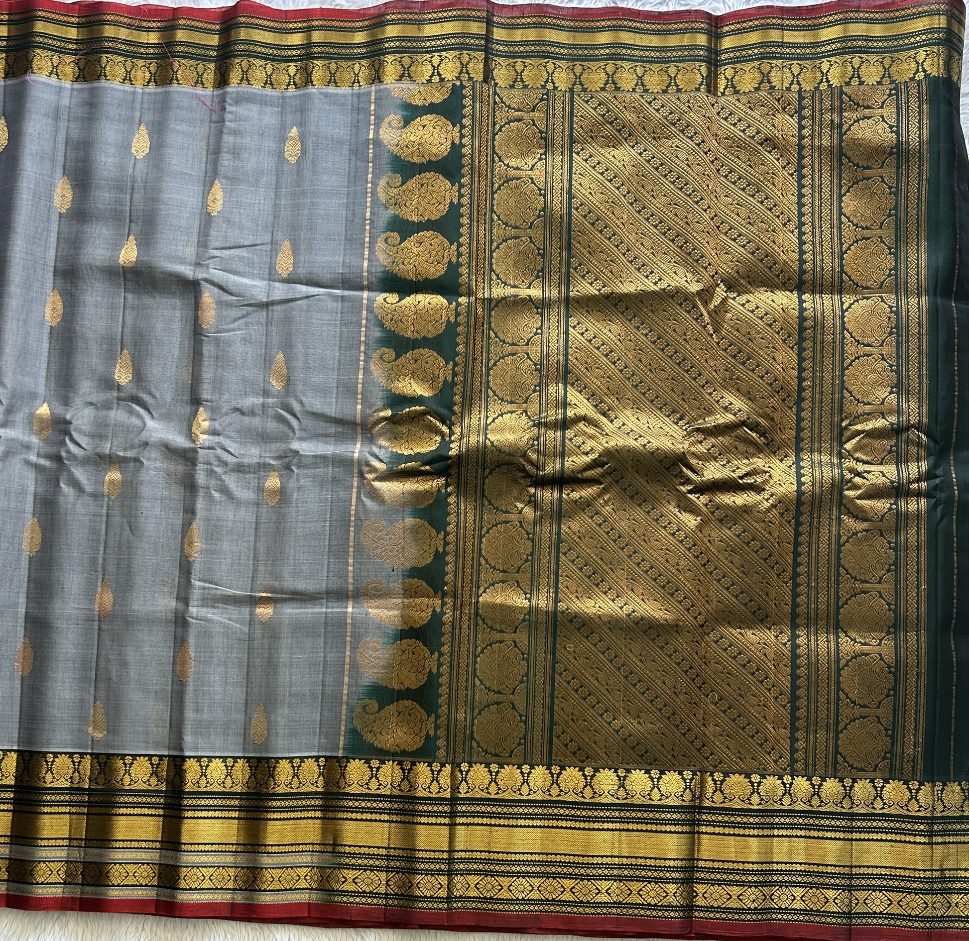 Gadwal Sico Saree Gray colored complemented with a Gold Zari Border - Sampradaya Designer Studio
