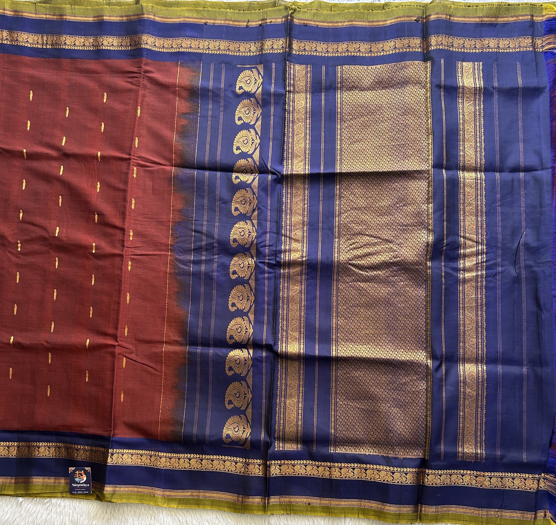 Gadwal Sico Saree Bam Maroon colored complemented with a Gold Zari Border - Sampradaya Designer Studio