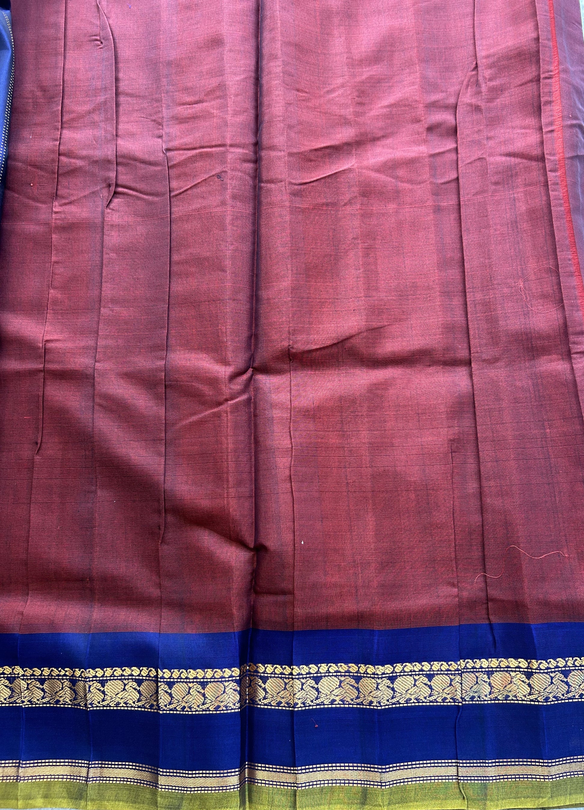 Gadwal Sico Saree Bam Maroon colored complemented with a Gold Zari Border - Sampradaya Designer Studio