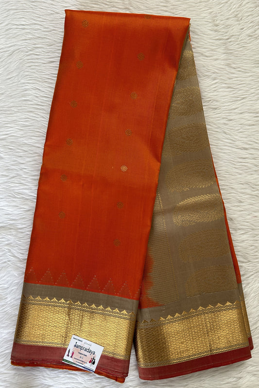 Gadwal Pattu Orange Colored Saree Complemented With a Pattu Light Gray Color Kanchi Border - Sampradaya Designer Studio