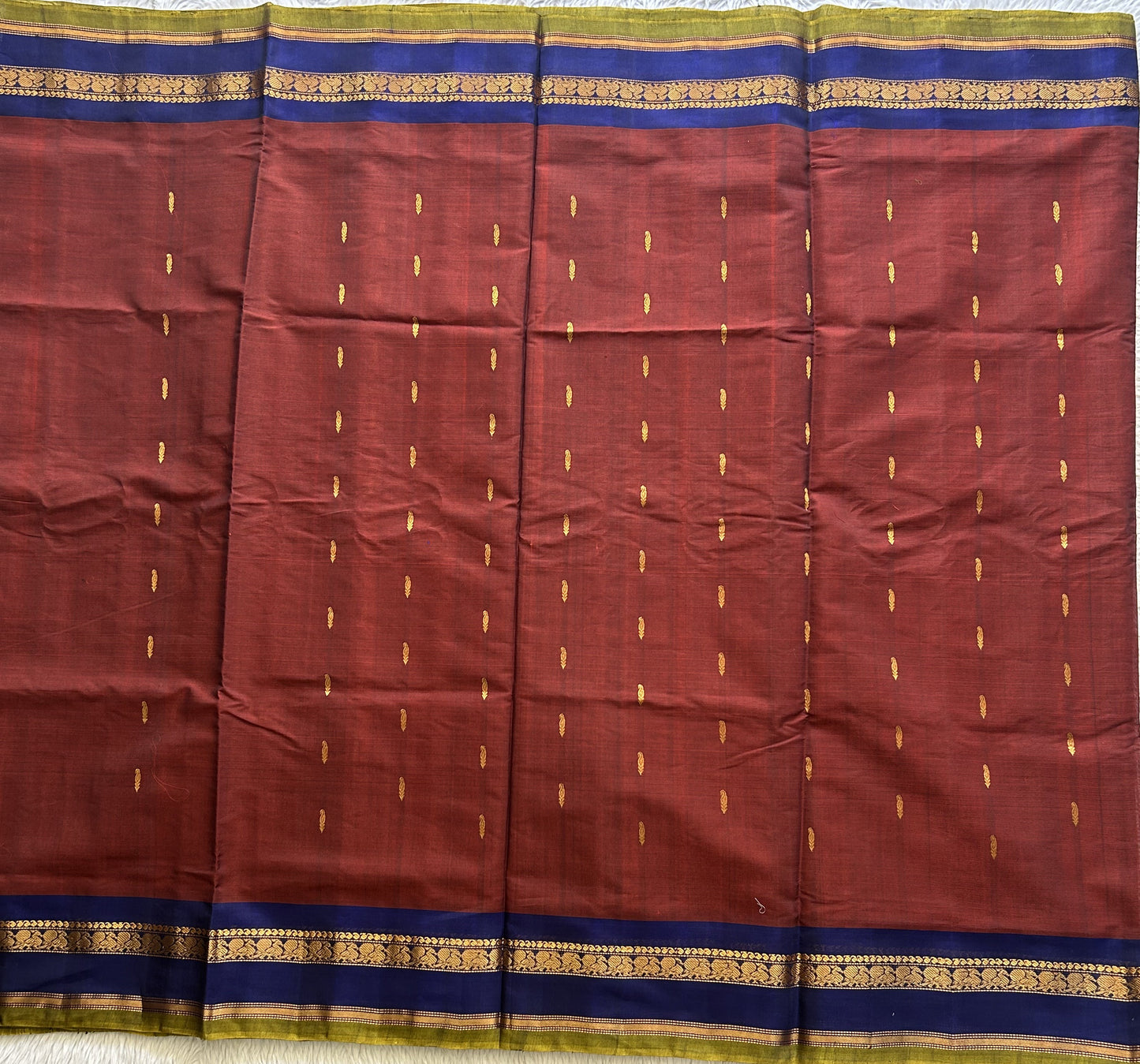 Gadwal Sico Saree Bam Maroon colored complemented with a Gold Zari Border - Sampradaya Designer Studio
