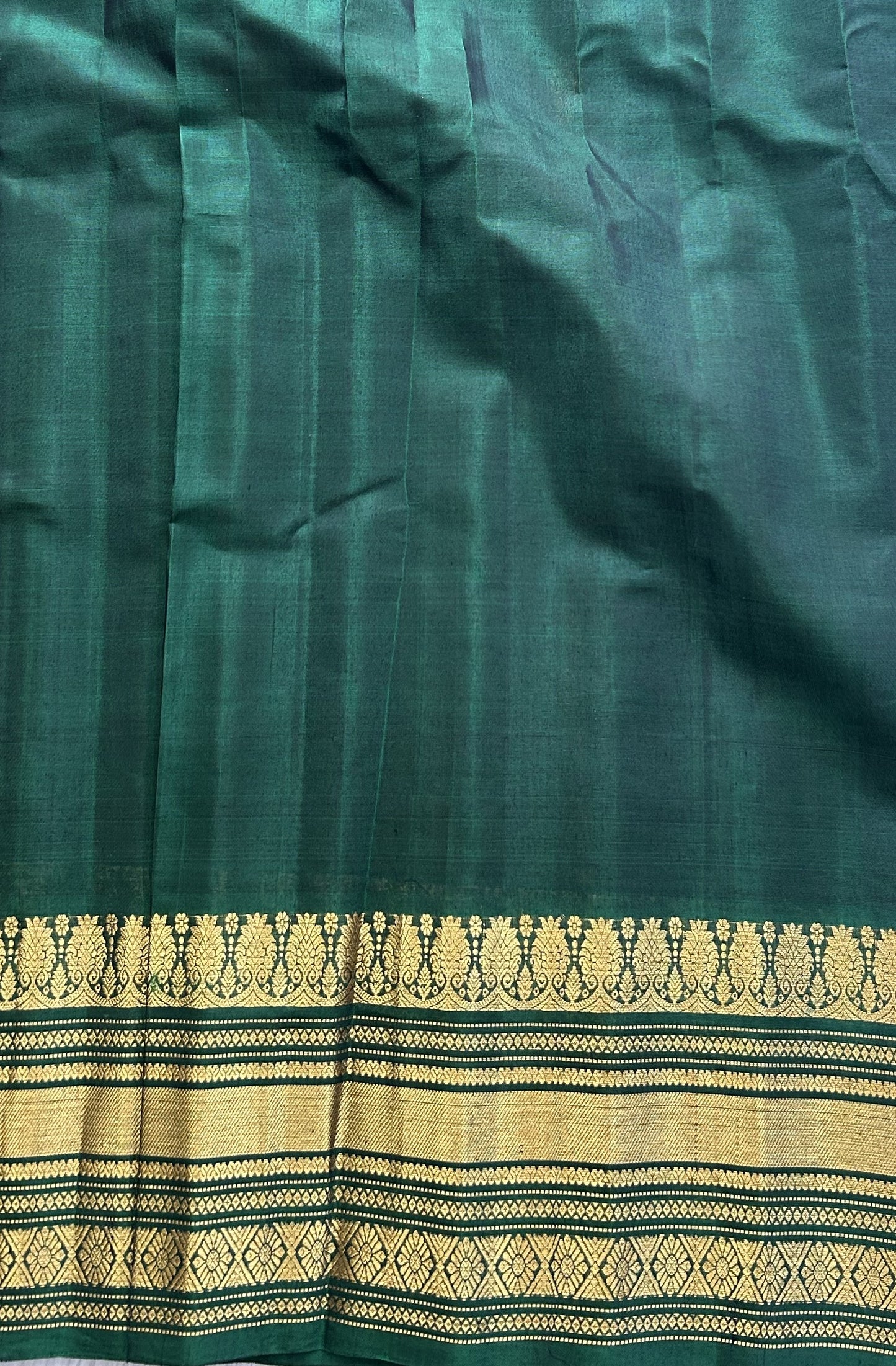 Gadwal Sico Saree  Maroon colored complemented with a Gold Zari Border - Sampradaya Designer Studio