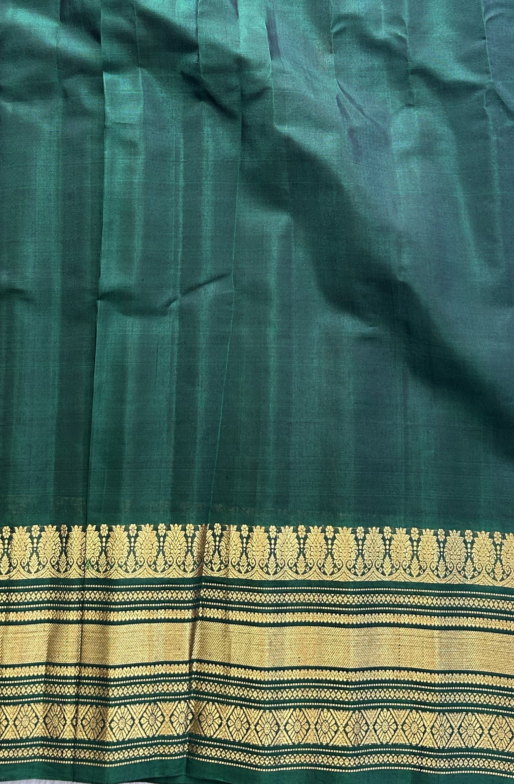 Gadwal Sico Saree  Maroon colored complemented with a Gold Zari Border - Sampradaya Designer Studio