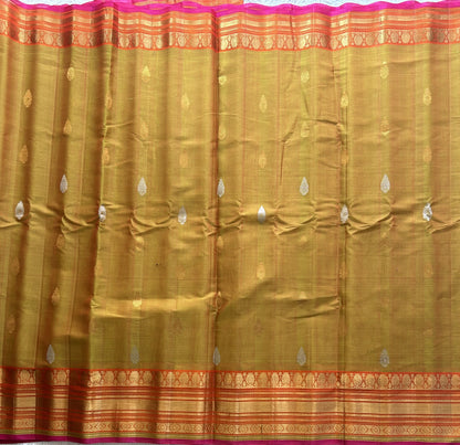 Gadwal Sico Saree Dijon Yellow colored complemented with a Gold Zari Border - Sampradaya Designer Studio