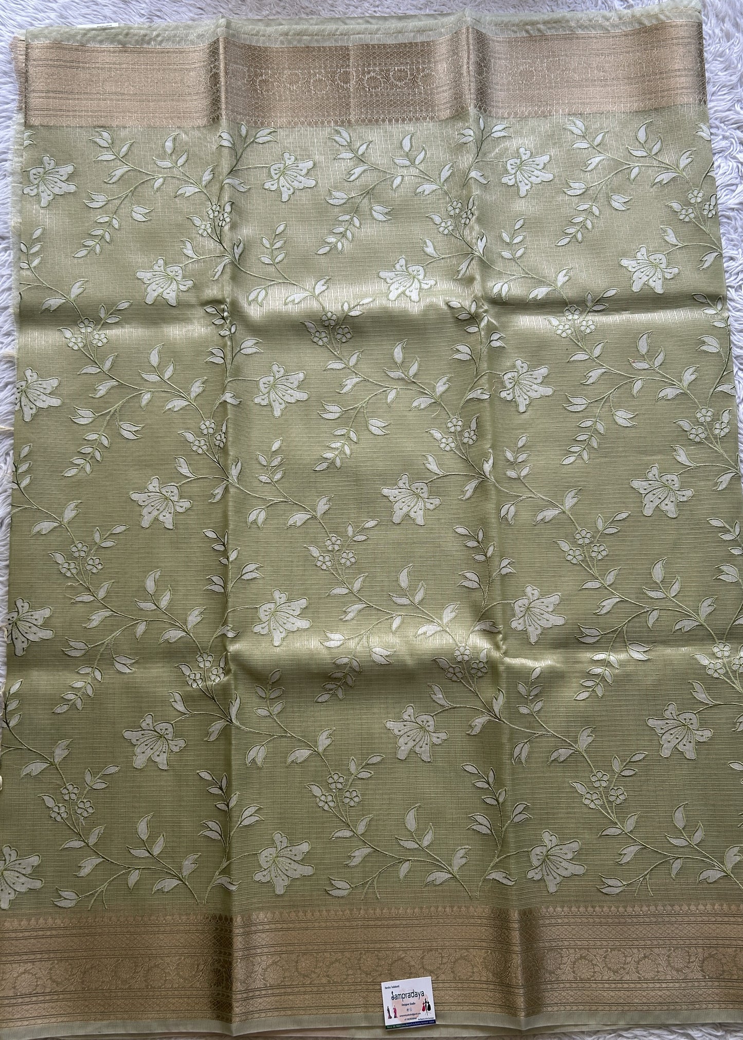 Silk kota Saree Tea Green colored Elegantly Paired with a Zari Border. - Sampradaya Designer Studio