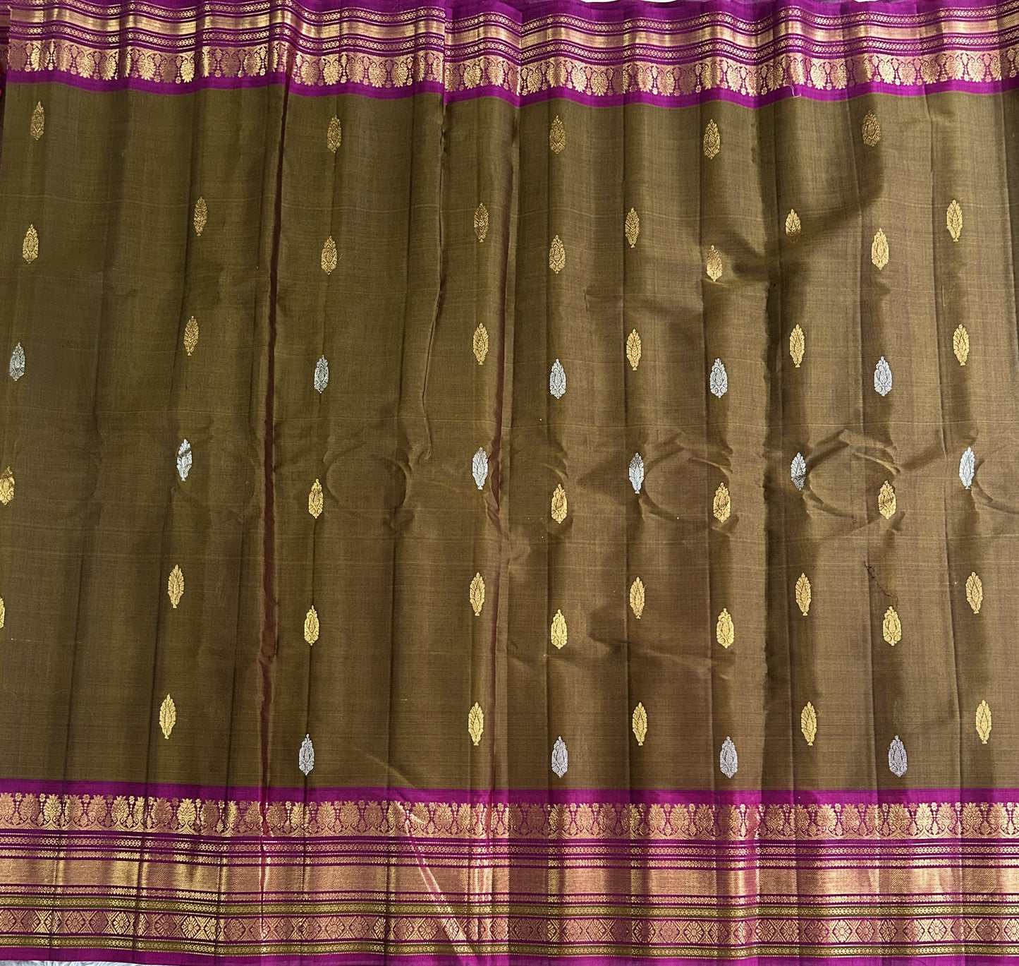 Gadwal Sico Saree Peanut colored complemented with a Gold Zari Border - Sampradaya Designer Studio