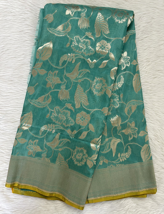Banarasi Katan Silk Saree sea Green colored Saree complemented with a Silver Zari border. - Sampradaya Designer Studio