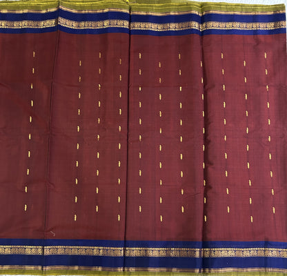 Gadwal Sico Saree  Maroon colored complemented with a Gold Zari Border - Sampradaya Designer Studio
