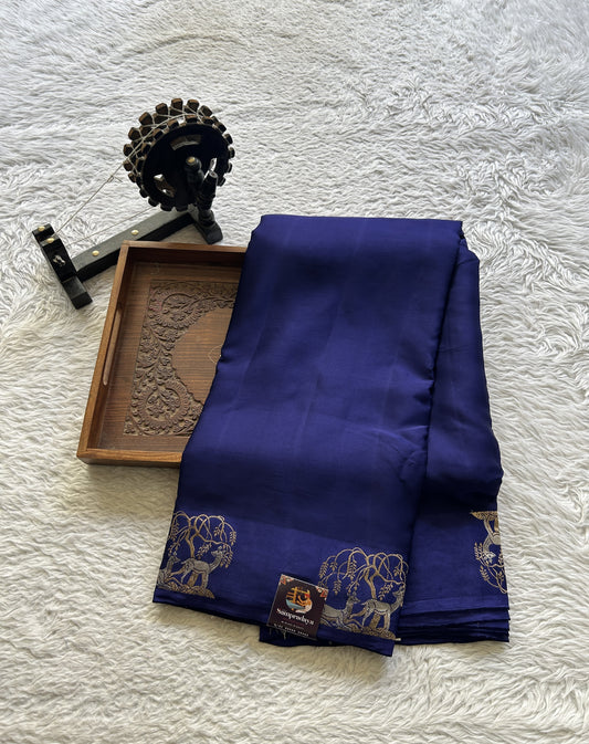 Satin Georgette Plain Saree Violet Colored Elegantly Paired with a Buti Border. - Sampradaya Designer Studio
