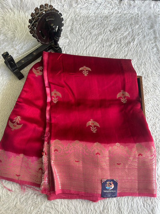 Banarasi Fancy Saree cerise Pink Colored Complemented with a Silver Zari Border.