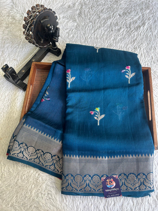 Banarasi Fancy Saree Olympic blue Colored Complemented with a Silver Zari Border.