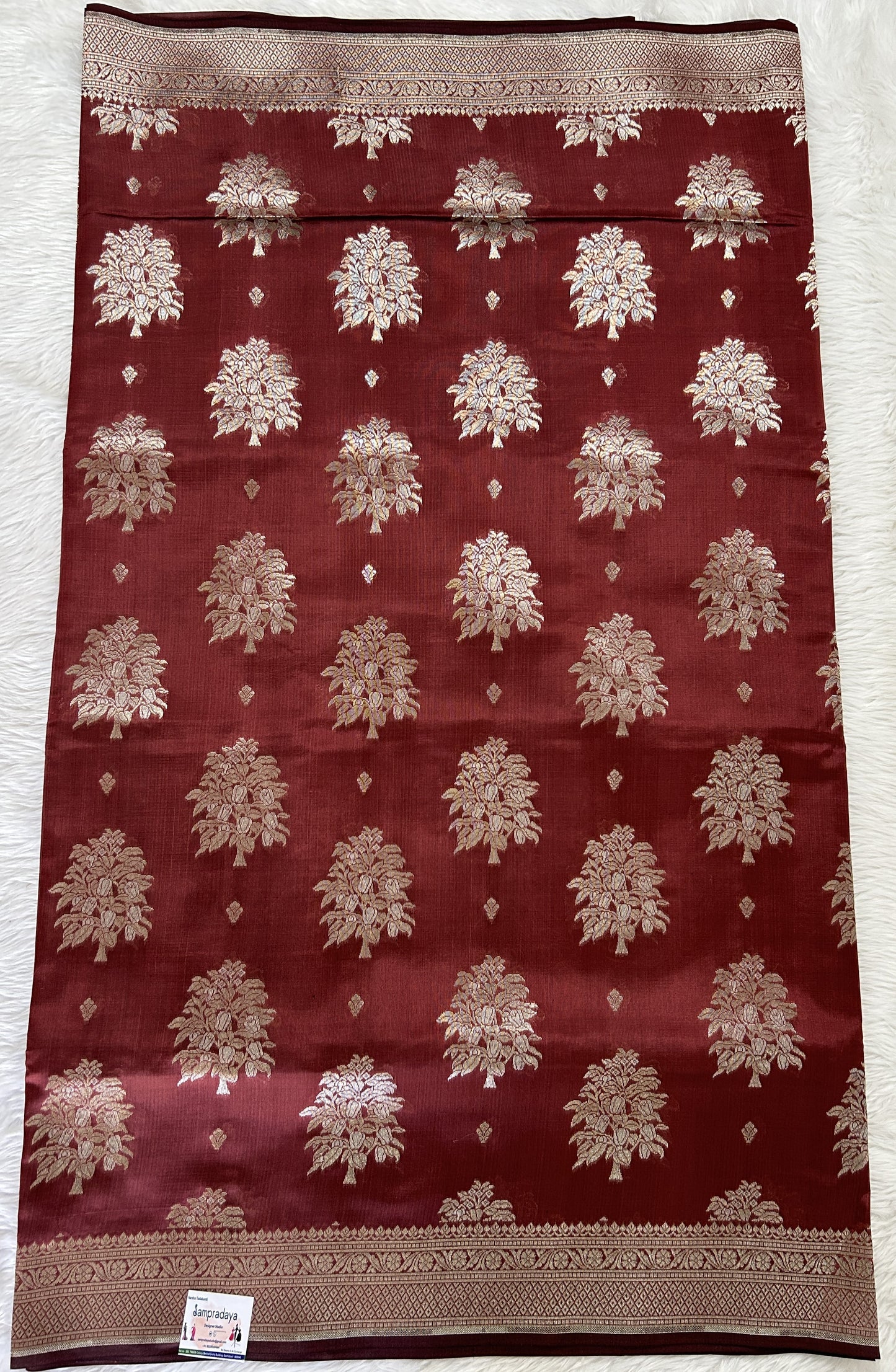 Banarasi Katan Silk Saree Pastel Brown colored Saree complemented with a Light Gold Zari border. - Sampradaya Designer Studio