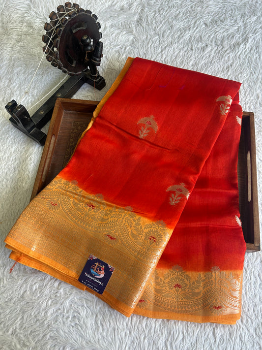 Banarasi Fancy Saree Rust Orange Colored Complemented with a Solver Zari Border.