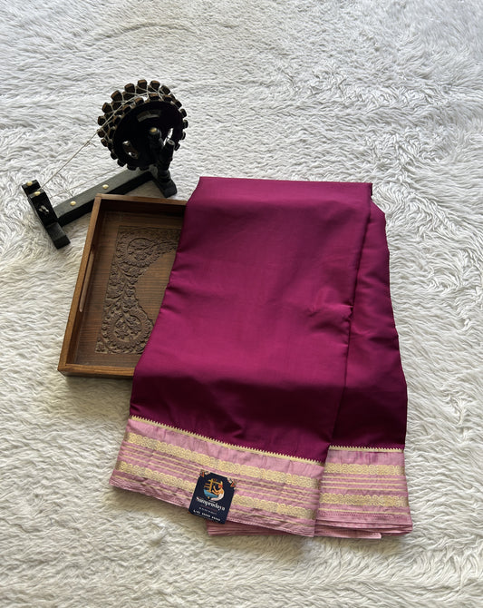 Semi Georgette Saree Mulberry Colored elegantly adorned with a Zari Border. - Sampradaya Designer Studio