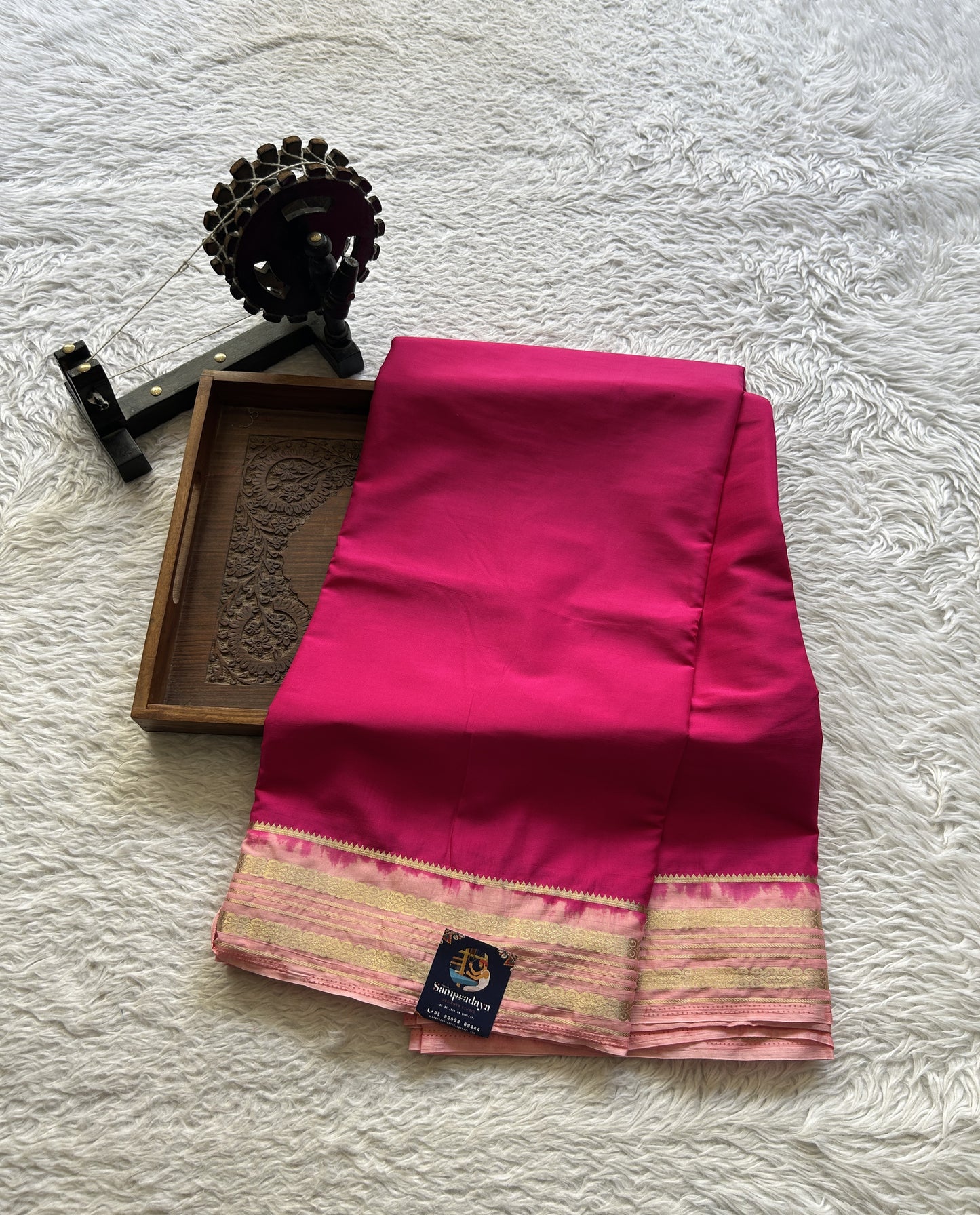 Semi Georgette Saree Pink Colored elegantly adorned with a Zari Border. - Sampradaya Designer Studio