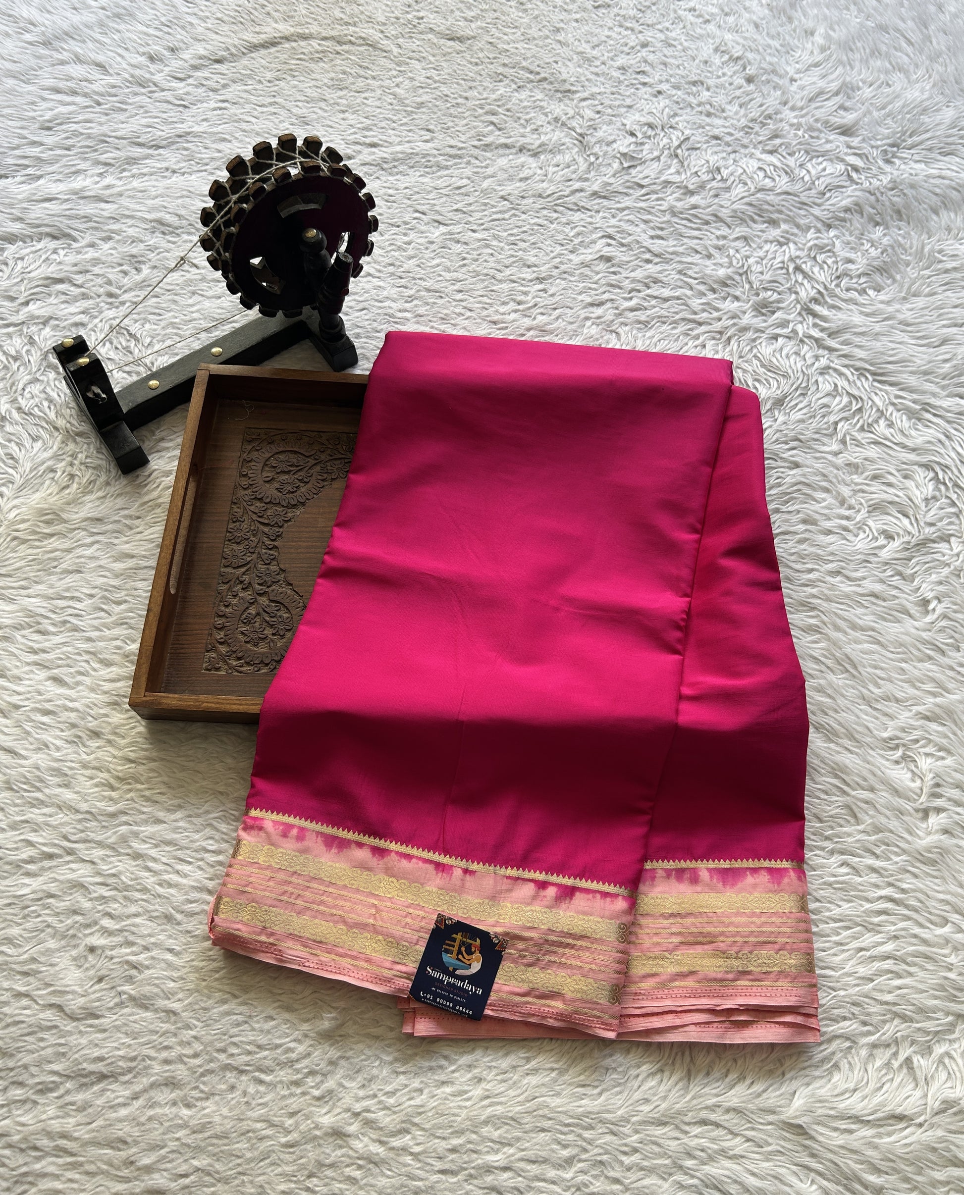 Semi Georgette Saree Pink Colored elegantly adorned with a Zari Border. - Sampradaya Designer Studio