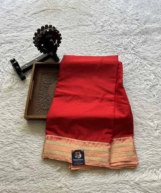 Semi Georgette Saree Red Colored elegantly adorned with a Zari Border. - Sampradaya Designer Studio