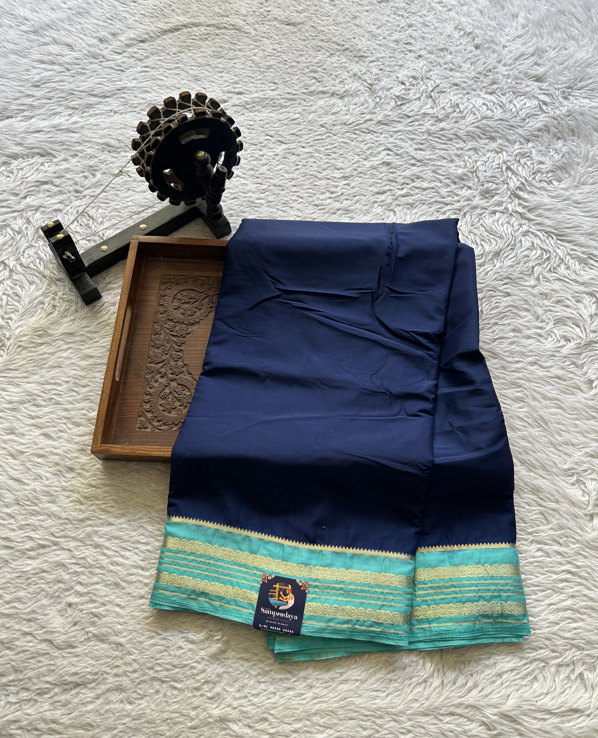 Semi Georgette Saree Royal Blue Colored elegantly adorned with a Zari Border. - Sampradaya Designer Studio