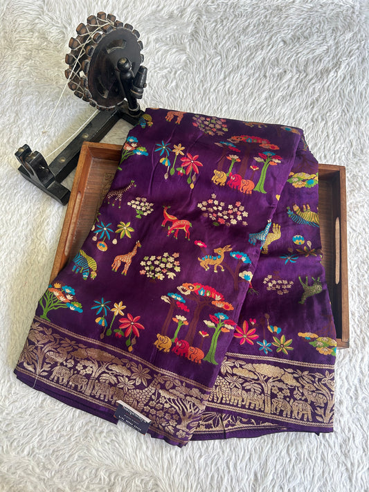 Banarasi Fancy Saree Metallic Purple Colored Complemented with a Gold Zari Border.